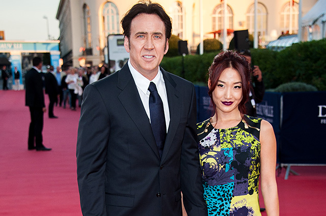DEAUVILLE, FRANCE - SEPTEMBER 02:  Nicolas Cage and his wife Alice Kim arrive at the premiere of the movie 'Joe' during the 39th Deauville American film festival on September 2, 2013 in Deauville, France.  (Photo by Francois Durand/Getty Images)