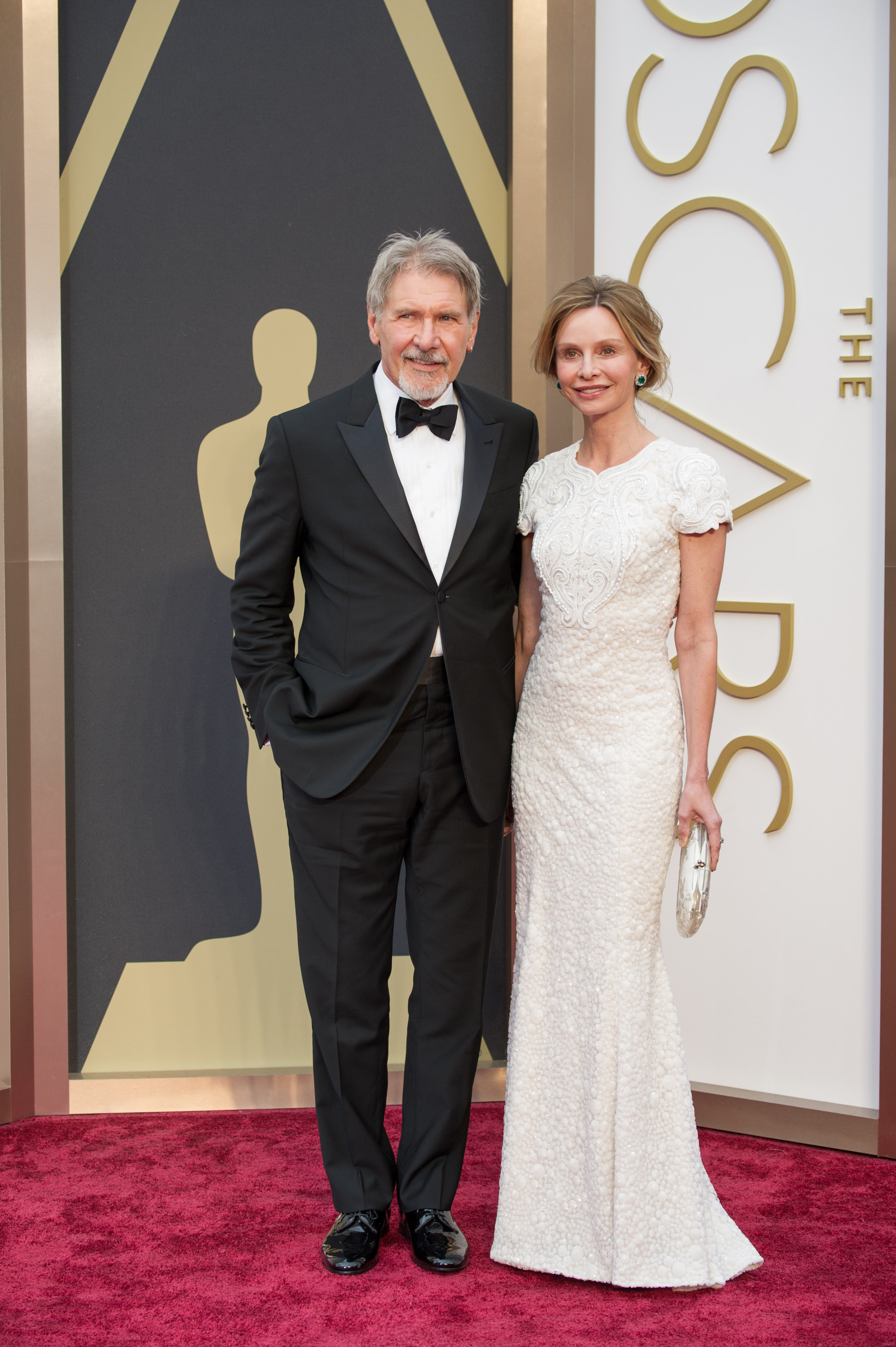 Harrison Ford and Calista Flockhart arrive for the live ABC Telecast of The 86th Oscars® at the Dolby® Theatre on March 2, 2014 in Hollywood, CA.